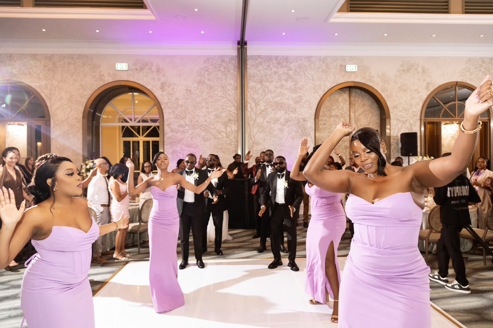 Bridal party in lilac on the dance floor
