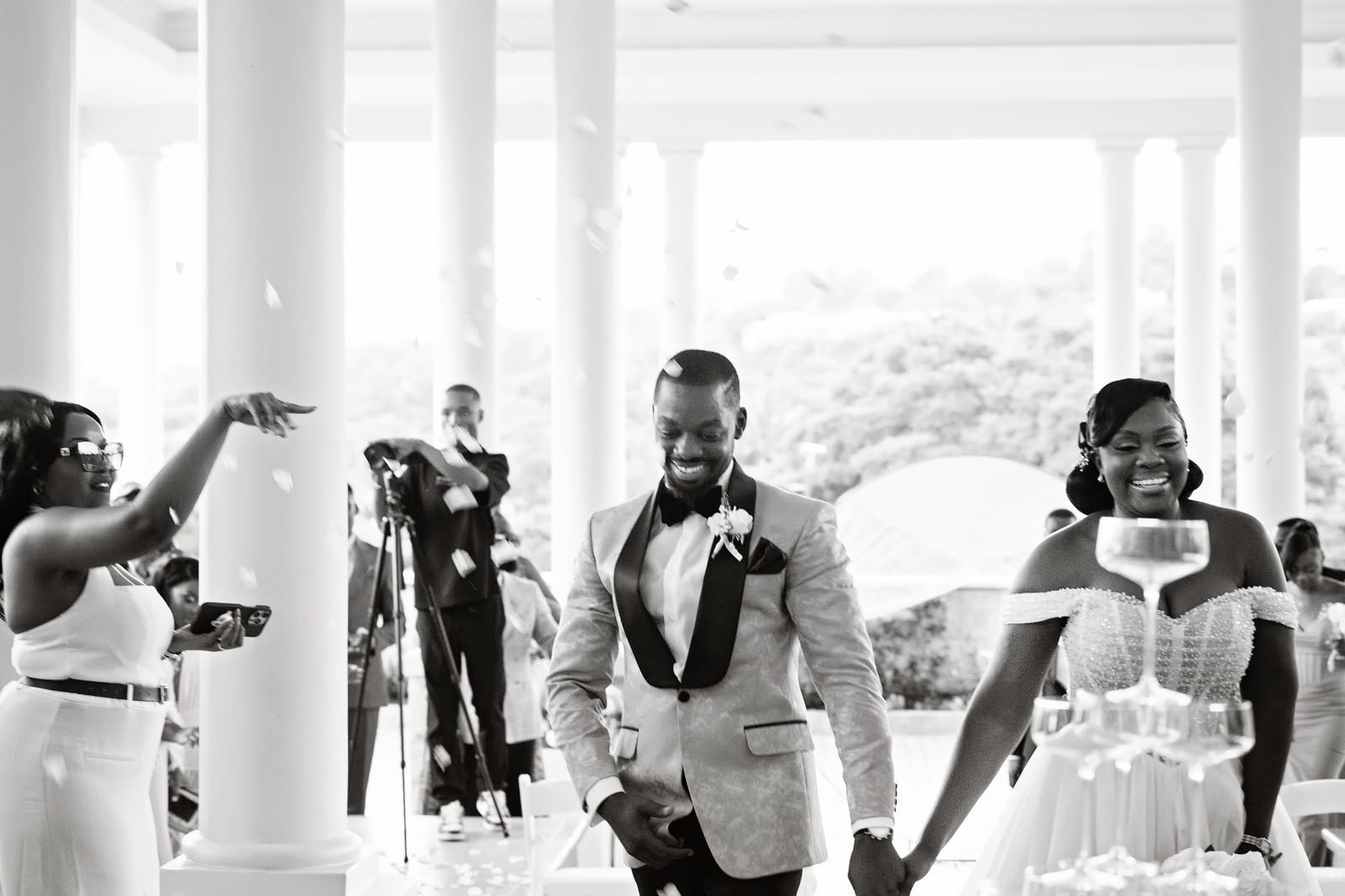 Newlyweds greeted by their guests